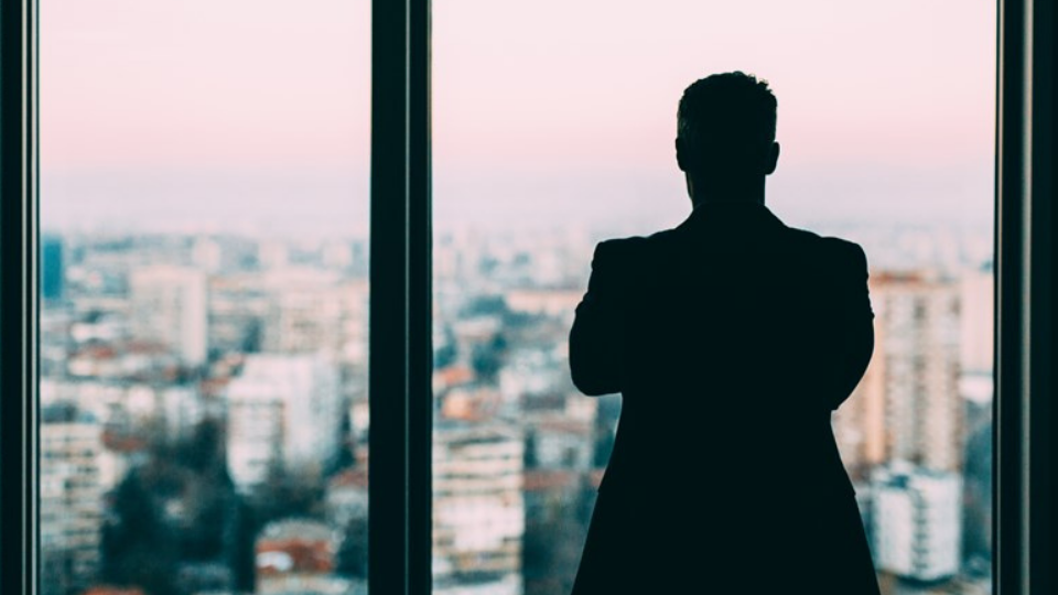 Businessman At The Window