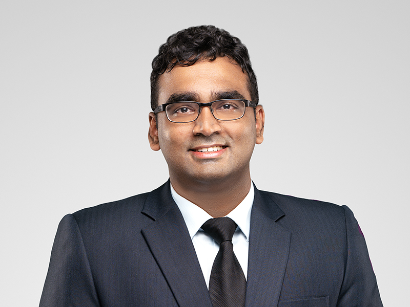 Sanjev Guna Harneys front portrait image on a grey background