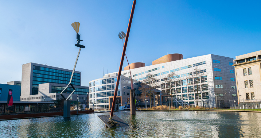 Architecture along a pond at World Forum, The Hague