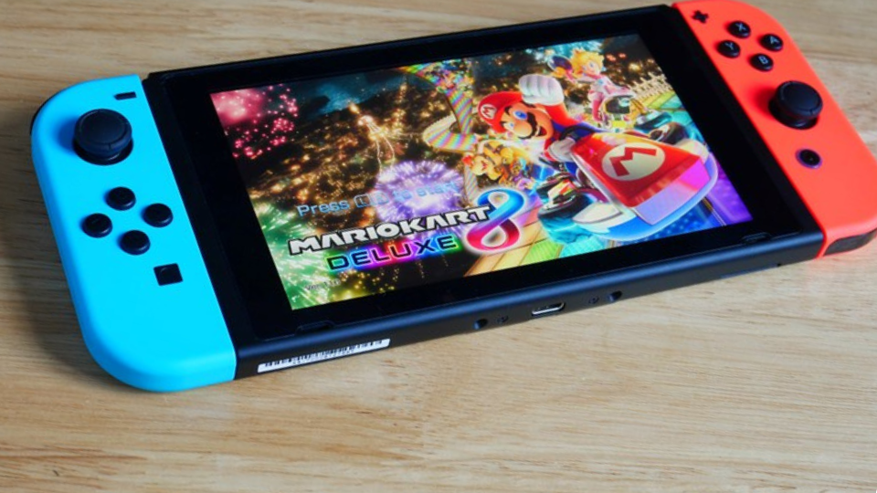 Nintendo Switch showing its screen with Mario Kart 8 Deluxe game