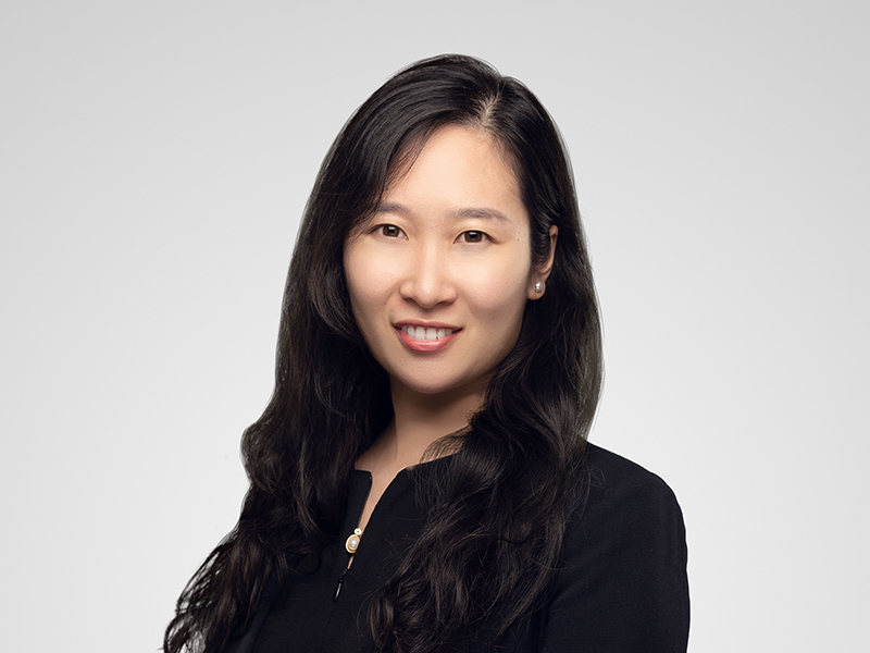 Katrine Yang Harneys front portrait image on a grey background