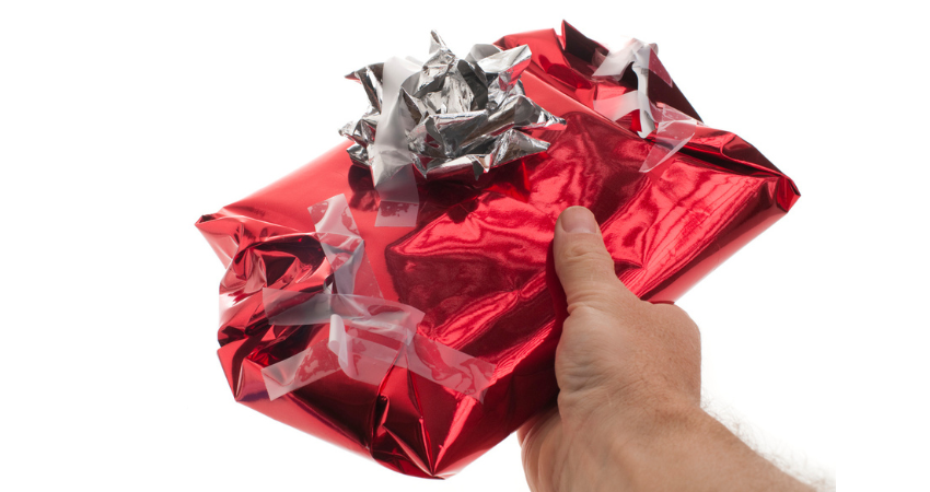 Man gives badly wrapped, messy Christmas present