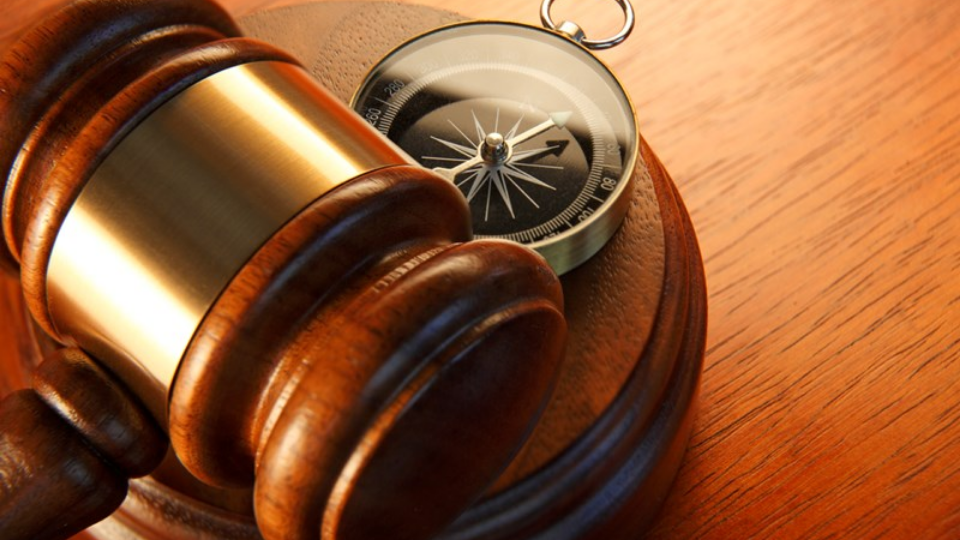 Compass and gavel on sound block