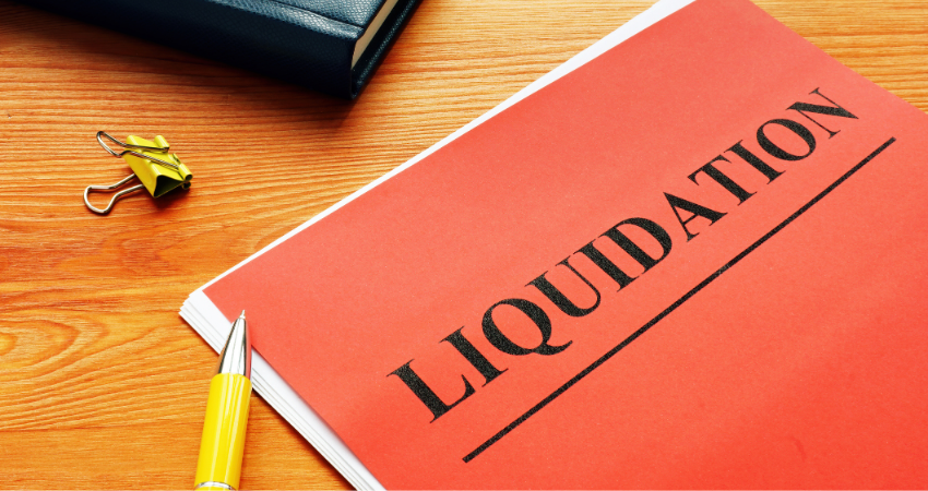 The word liquidation is printed on the red page