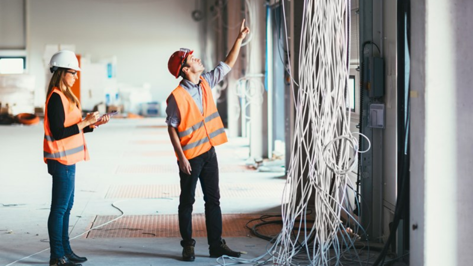 Maintenance Engineers checking cables