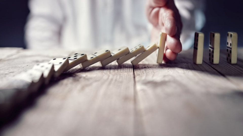 Stop the domino effect concept for business solution and intervention