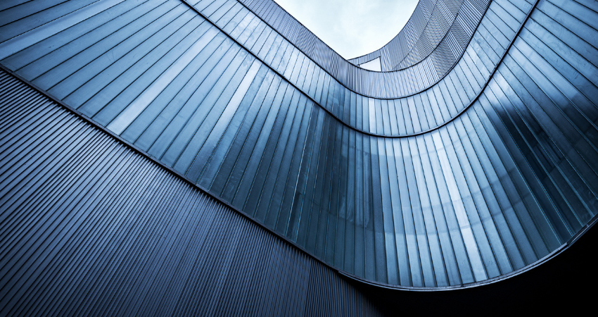 Curved Glass Facade Architecture With Blue Tones