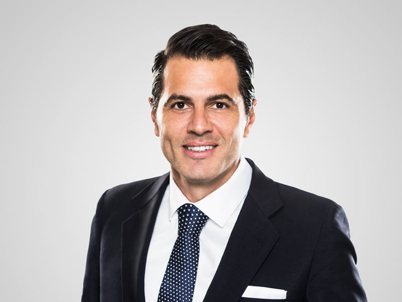 Pavlos Aristodemou Harneys front portrait image on a grey background